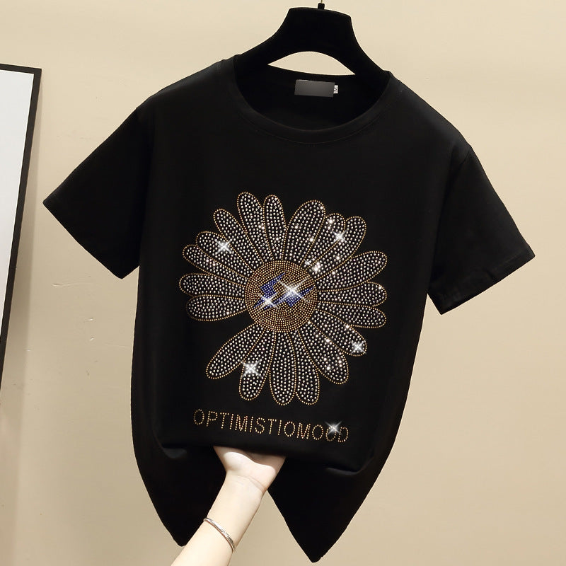 Dame T-Shirt med glitrende blomstermotiv og positiv besked Stilla