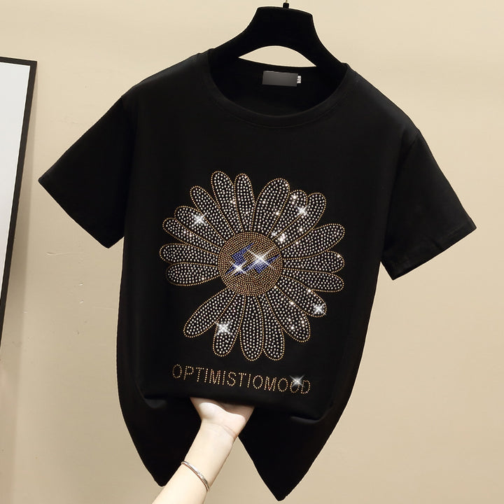 Dame T-Shirt med glitrende blomstermotiv og positiv besked Stilla