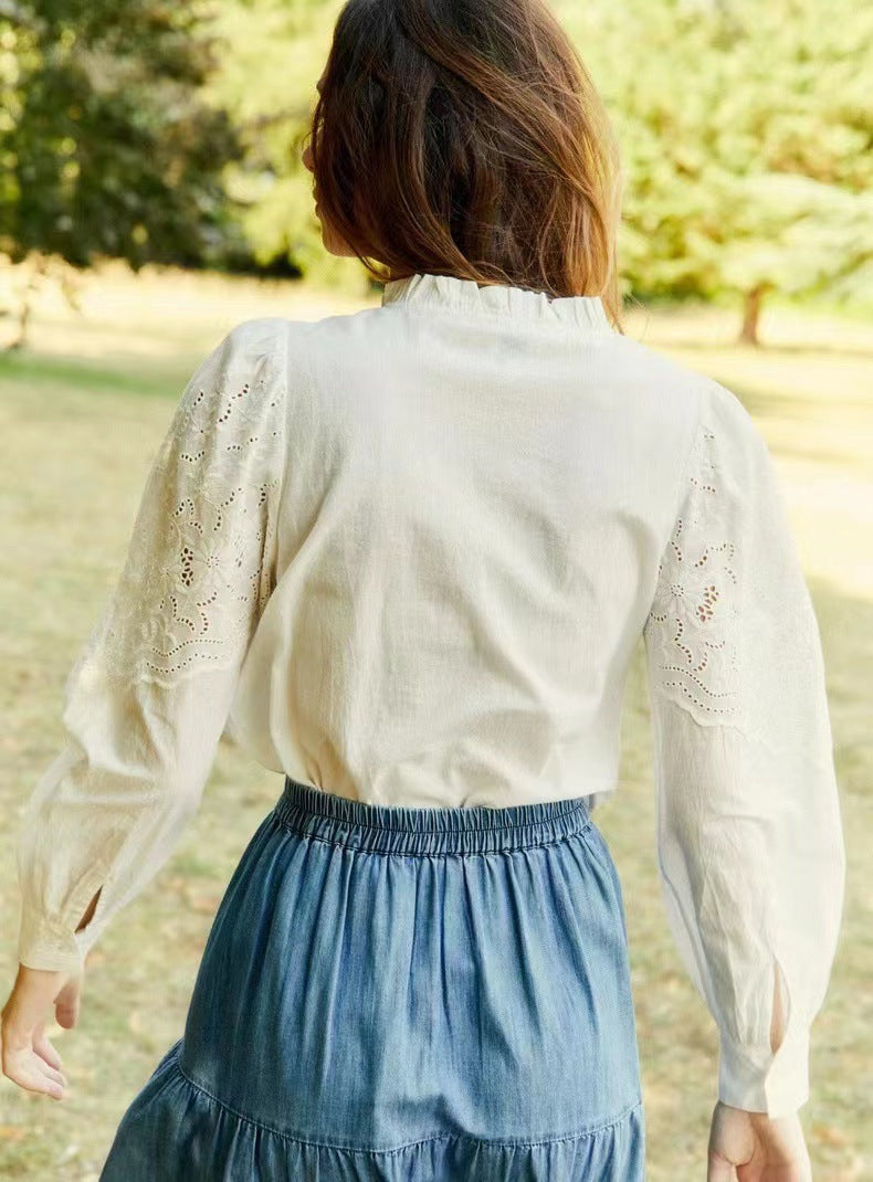 Damebluse med detaljeret hulbroderi og elegante puffærmer Stilla