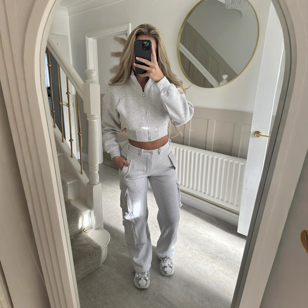 Kvinders fashionable cropped fritids sæt med funktionel lynlås og praktiske lommer