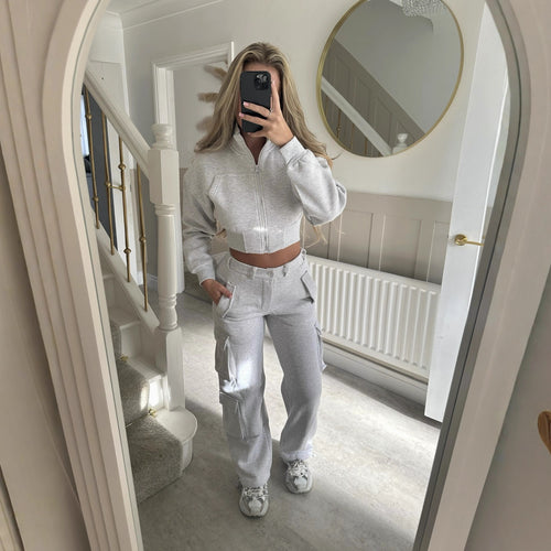 Kvinders fashionable cropped fritids sæt med funktionel lynlås og praktiske lommer