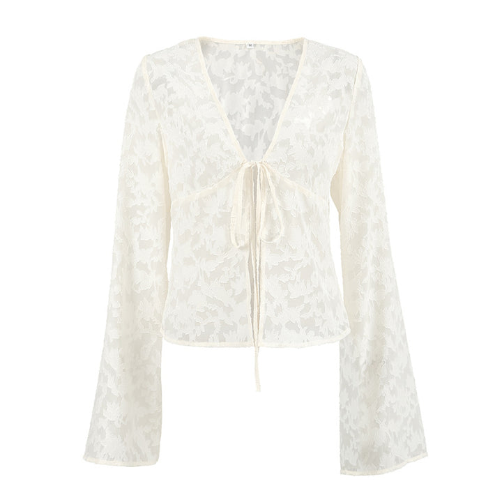 Dame gennemsigtig bluse med blomsterdesign og flæsedetaljer Stilla