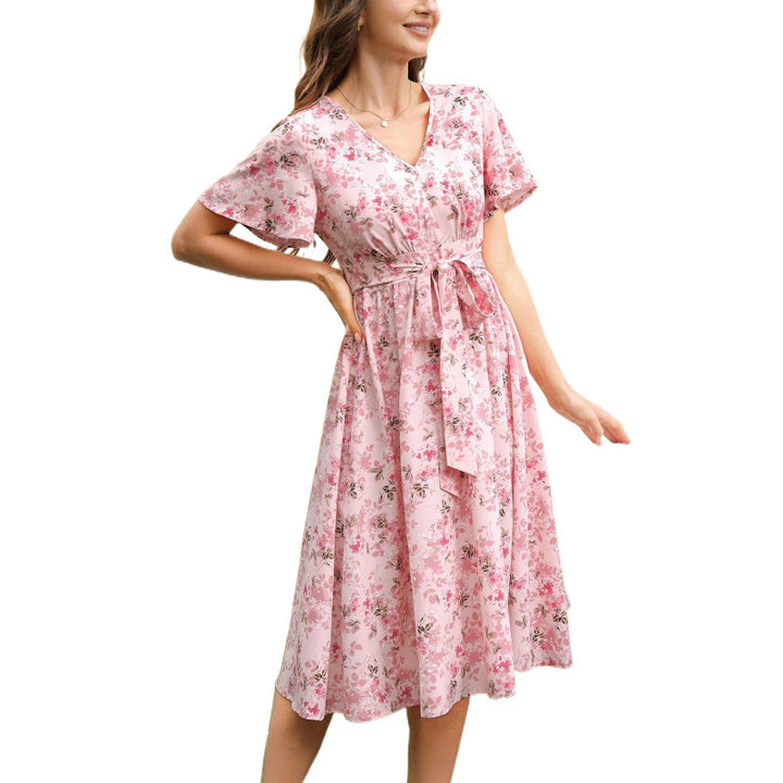 Dame Midi-Kjole med elegant blomsterdesign og figursyet snit Stilla