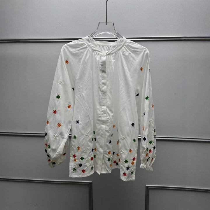 Damebluse med blomstermotiv og rynket ærme Stilla
