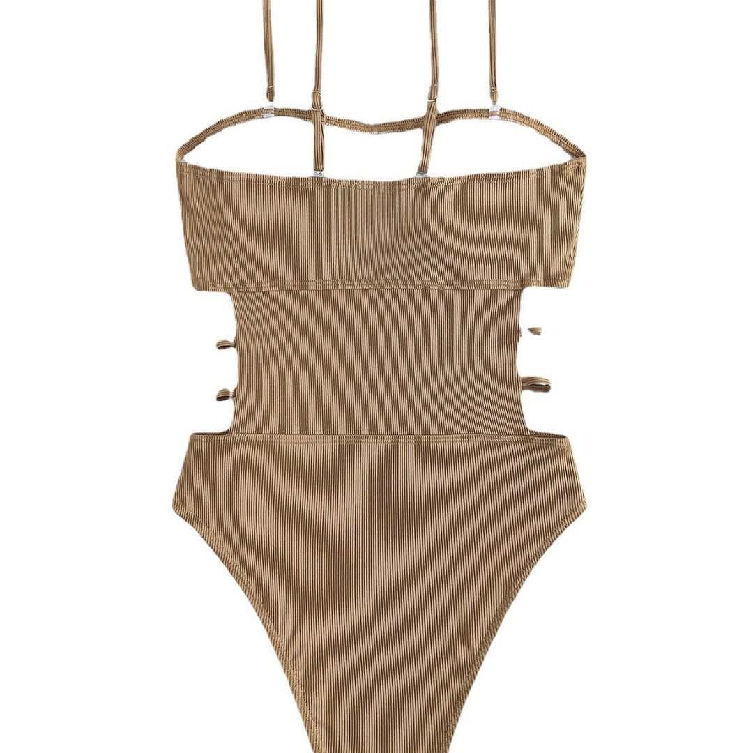 Dame one-piece badedragt med elegant schnit og sidelæns stropper Skovae