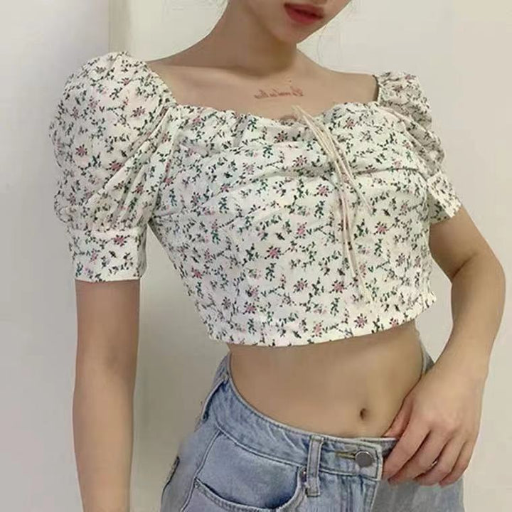 Kvindernes crop top med puffærmer og blomstermotiv