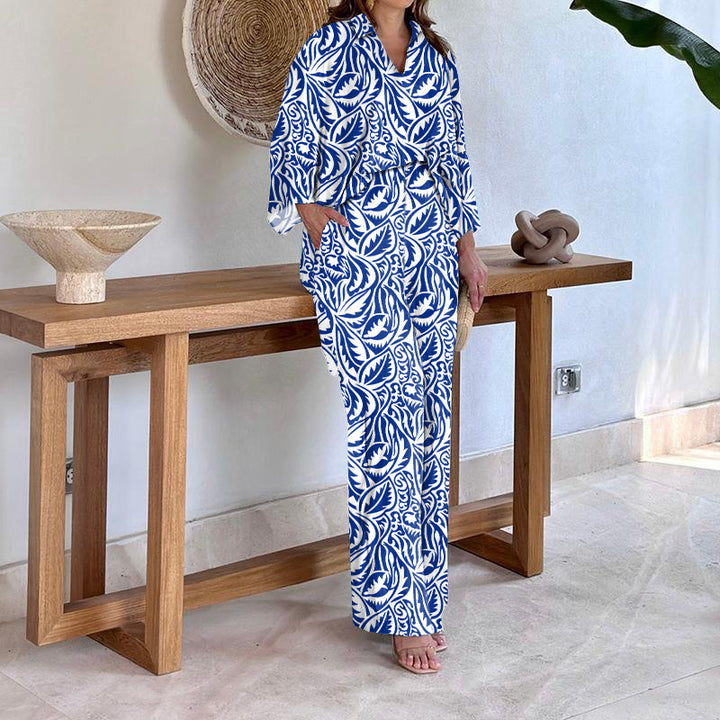 Dame Elegant og luftig strandkombination med florale mønstre Stilla
