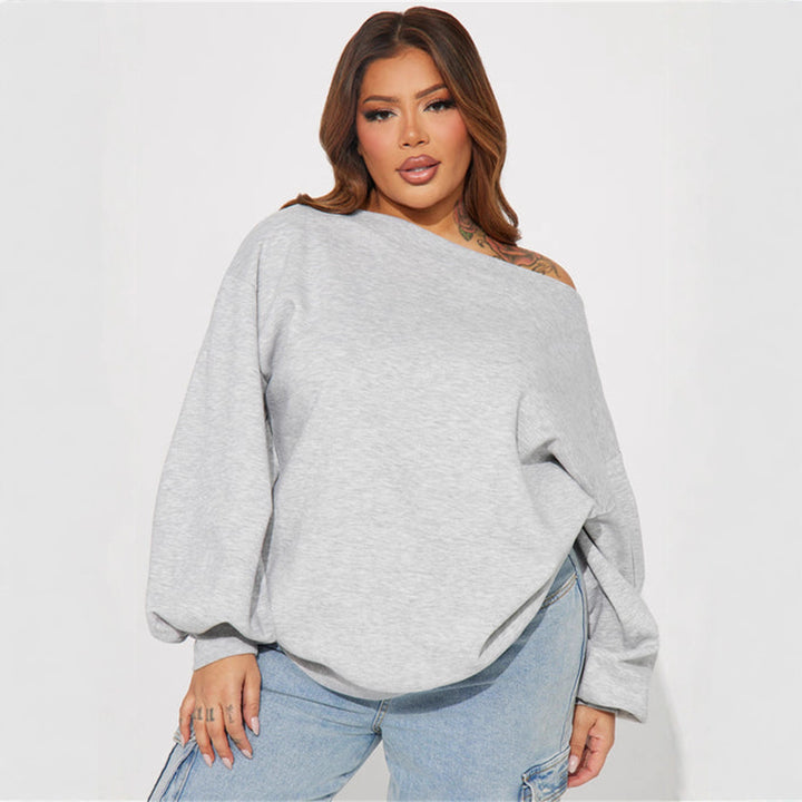 Kvinders oversized sweatshirt med asymmetrisk halsudskæring og ballonformede ærmer