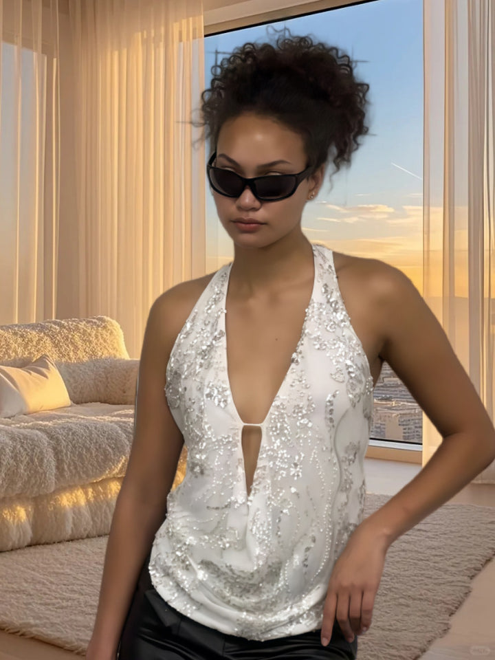 Dame funktionsbluse med glitrende pailletter og løs pasform Stilla