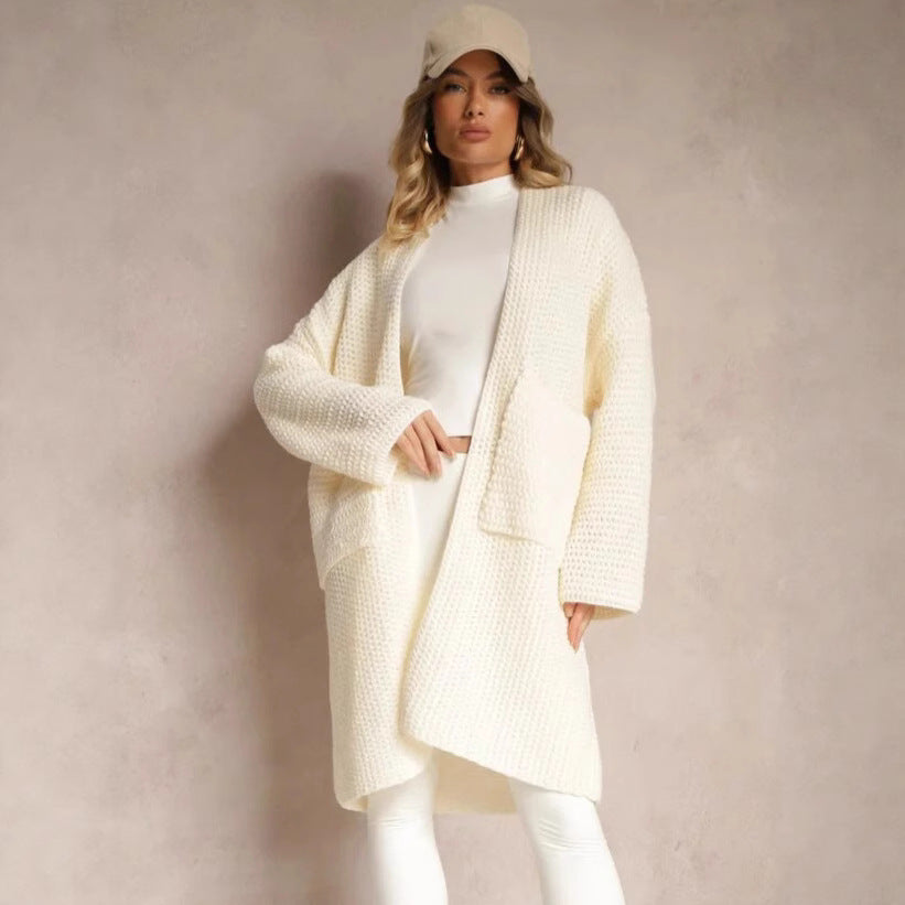 Kvinders oversized cardigan med dyb V-hals og praktiske lommer Stilla