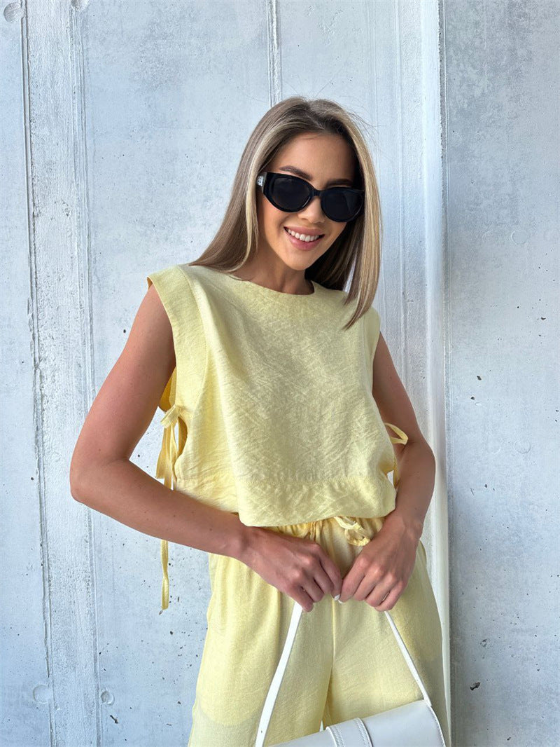 Kvinders bredbenede jumpsuit med lagdelt top og snøre Skovae