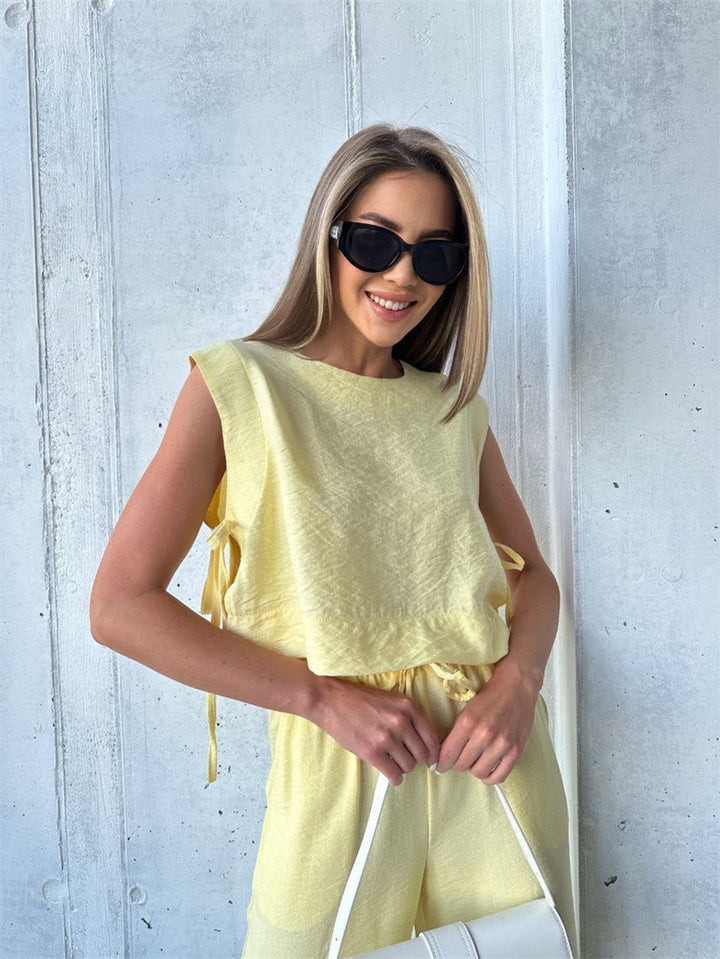 Kvinders bredbenede jumpsuit med lagdelt top og snøre Skovae
