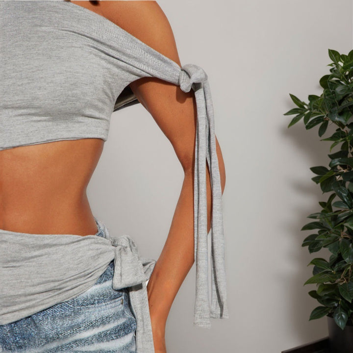 Kvinders asymmetrisk crop top med sidesløjfe Stilla