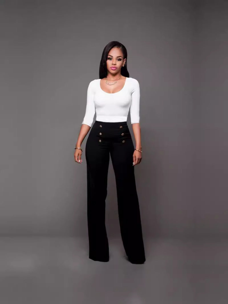 Dame Flared High-Waist-bukser med dekorative knapper Stilla