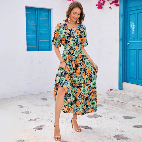 Dame maxikjole med blomstret design og svingende kant Stilla