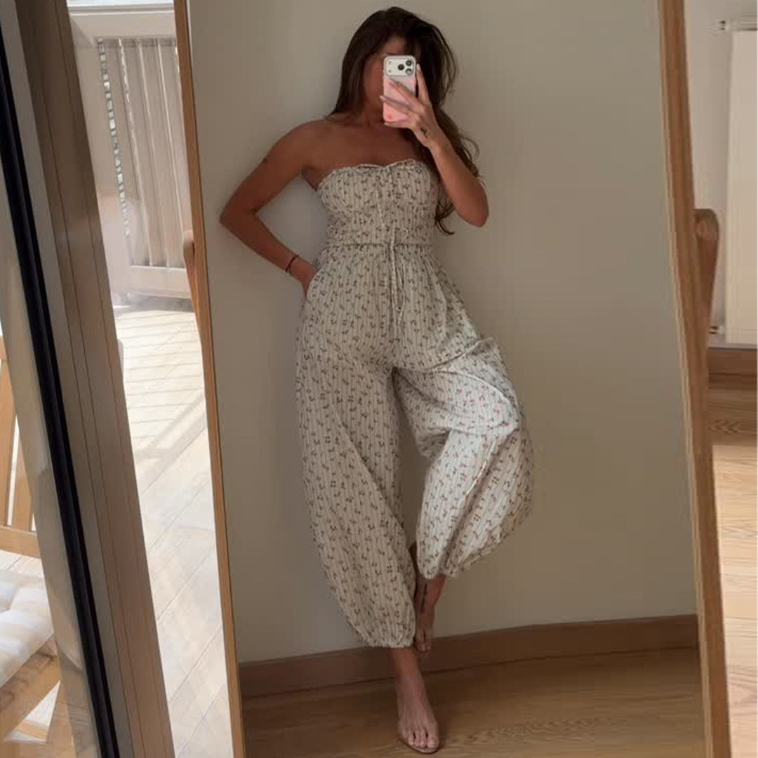 Dame jumpsuit med legende blomsterprint og elastisk taljebånd Skovae