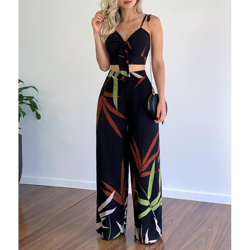 Kvinders elegante sæt med kombination af cropped top og brede bukser Stilla