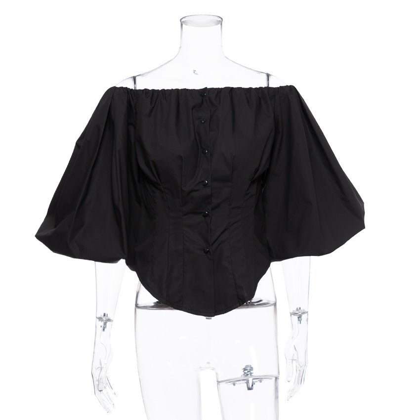 Damebluse med off-shoulder design og voluminøse pufærmer Stilla