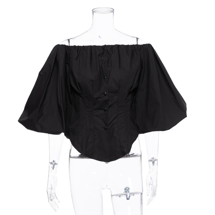 Damebluse med off-shoulder design og voluminøse pufærmer Stilla