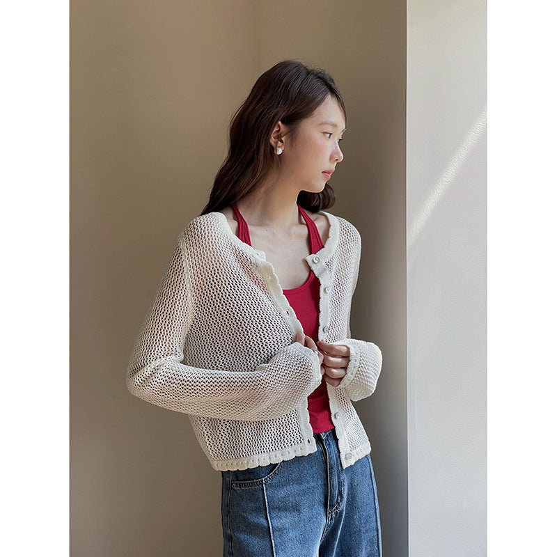 Dame strikstola med elegant off-shoulder-detalje Stilla
