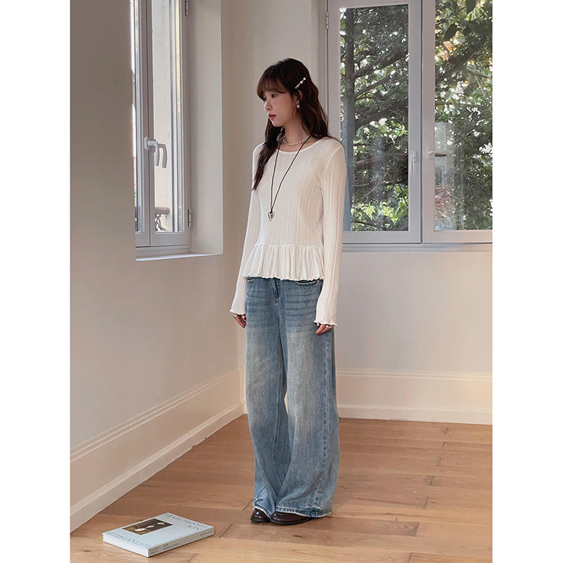 Dame ribstrik-top med feminin ruffle-silhuet og elegant høj krave Stilla