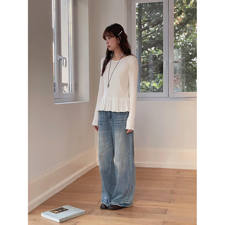 Dame ribstrik-top med feminin ruffle-silhuet og elegant høj krave Stilla