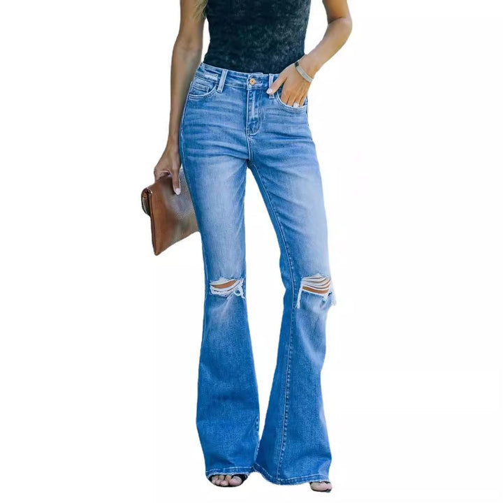 Dame udvidede jeans i retro stil med modne slidte effekter