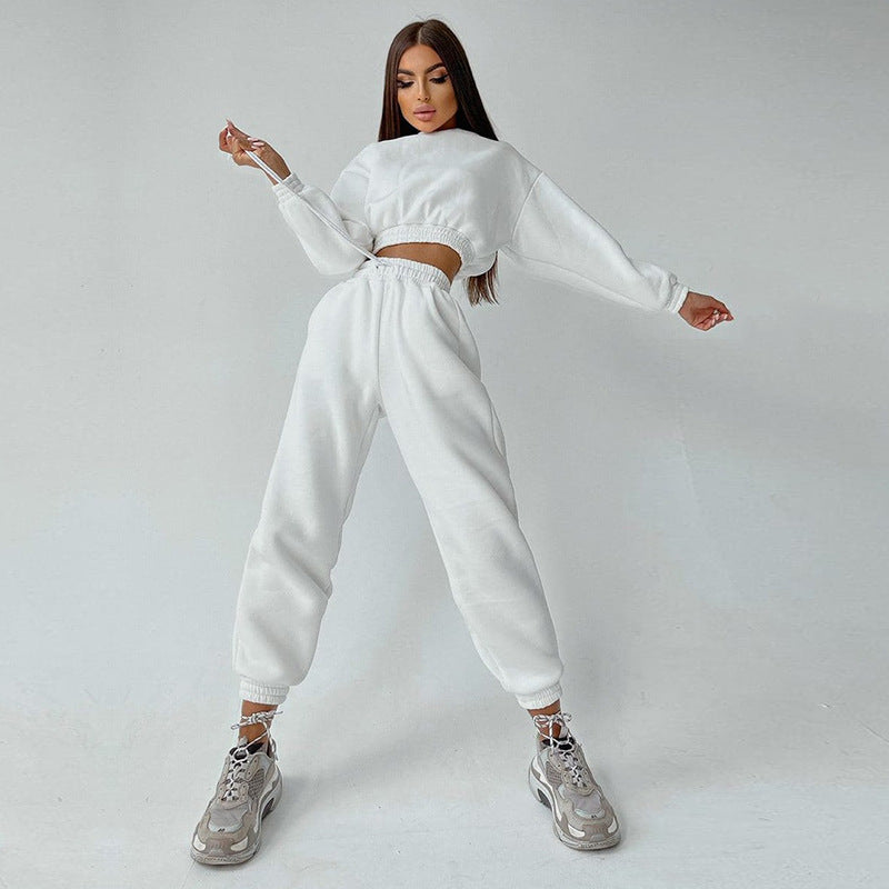 Kvinders sporty cropped sweat sæt med elastisk talje og praktiske lommer