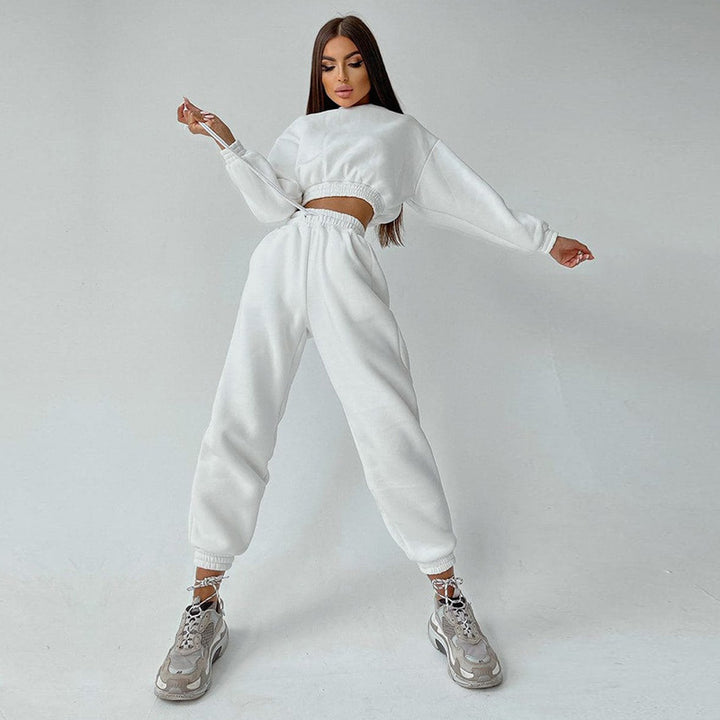 Kvinders sporty cropped sweat sæt med elastisk talje og praktiske lommer