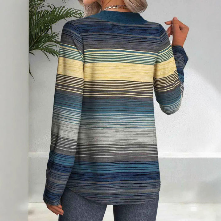 Dame top med kreative striber og dekorative knapper Stilla