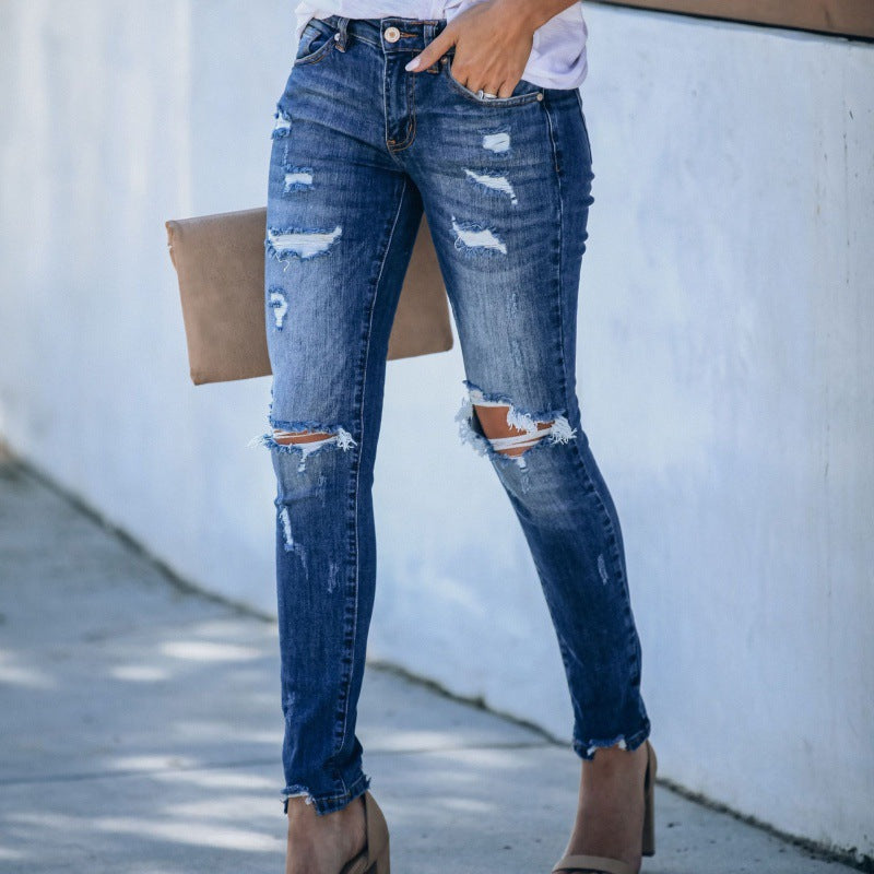 Kvinder's skinny jeans med trendy ødelagt look og tætsiddende snit Stilla
