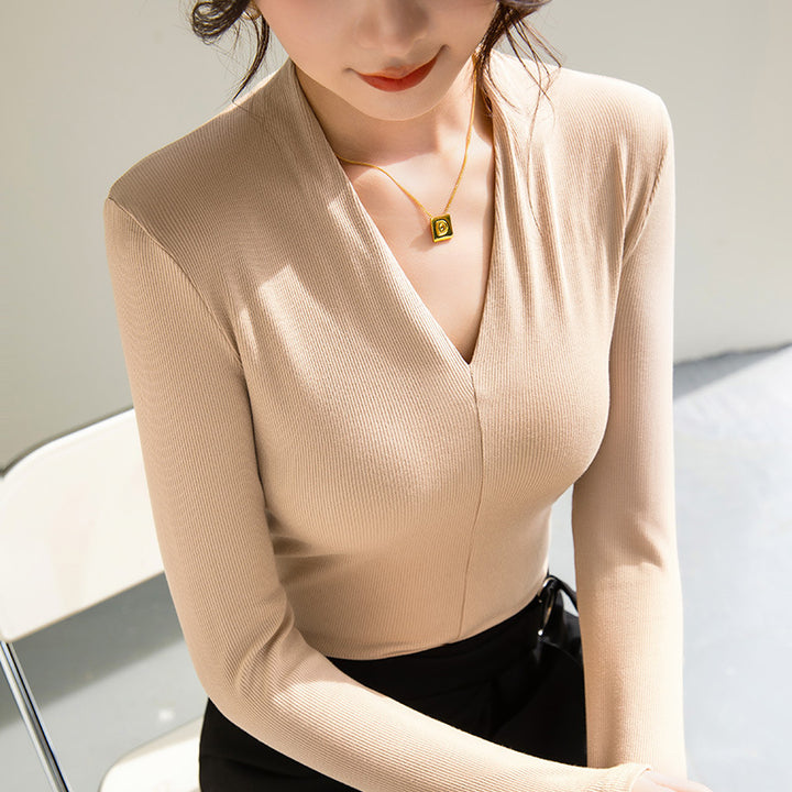 Dame Langærmet shirt med elegant V-hals og fin ribstruktur Stilla
