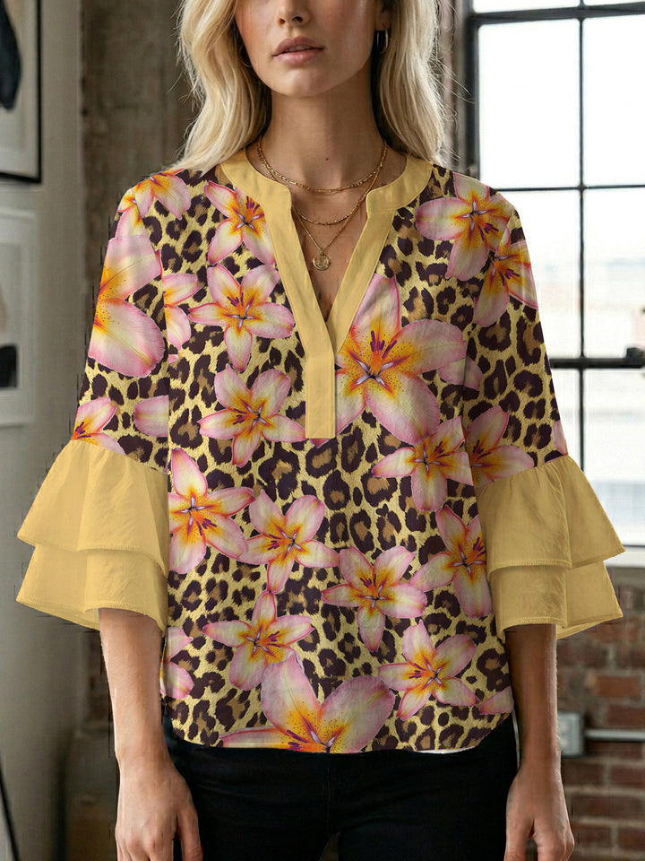 Dame afslappet bluse med flæseærmer og botanisk print Skovae