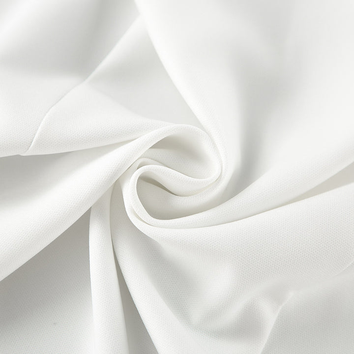 Damekjole med elegante udskæringer og svajende kant Stilla
