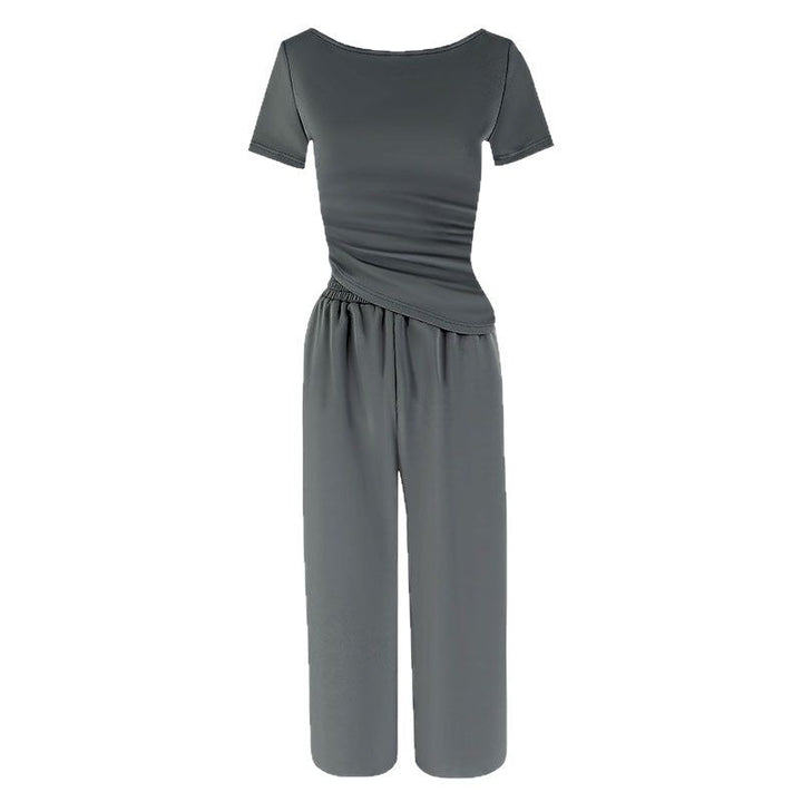 Dame jumpsuit med asymmetrisk snit og bredt skåret ben Skovae
