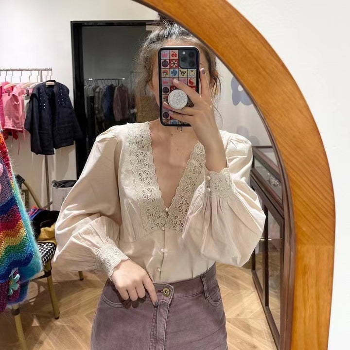 Damebluse med luksuriøse spidsedesign og voluminøse ærmer Stilla