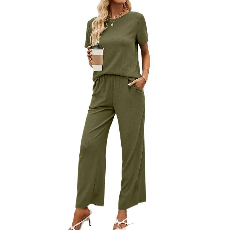 Dame kortærmet jumpsuit med flæse detaljer og bindebælte Skovae