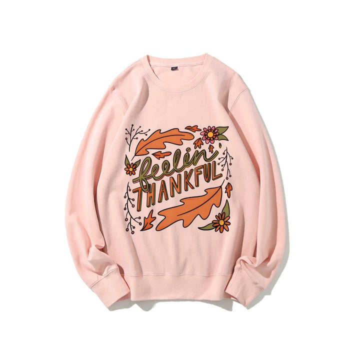 Kvinders sweatshirt med farverigt efterårsdesign og inspirerende tekst Stilla