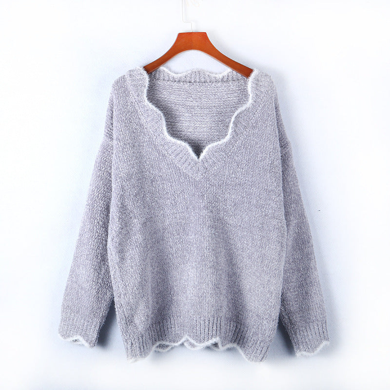 Dame afslappet strik pullover med V-hals og struktureret stof Stilla