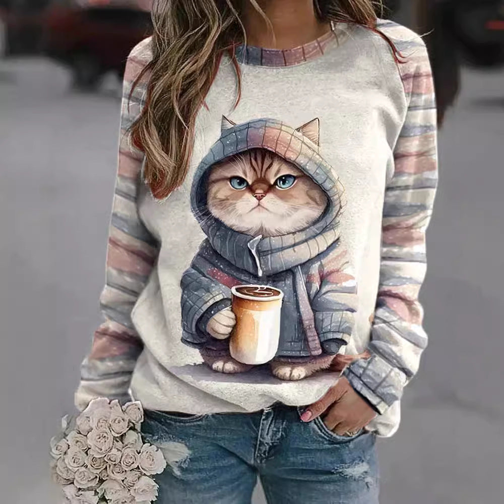 Damer med afslappet sweatshirt med stort kattefrontprint og stribede raglanærmer Skovae