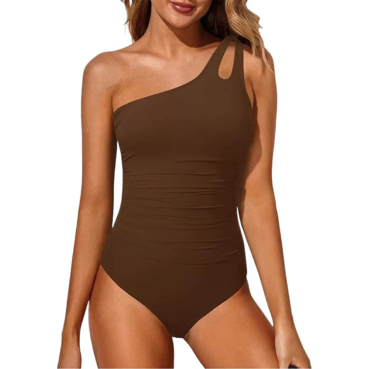 Dame étår badebadedragt med asymmetrisk cut-out-design Skovae