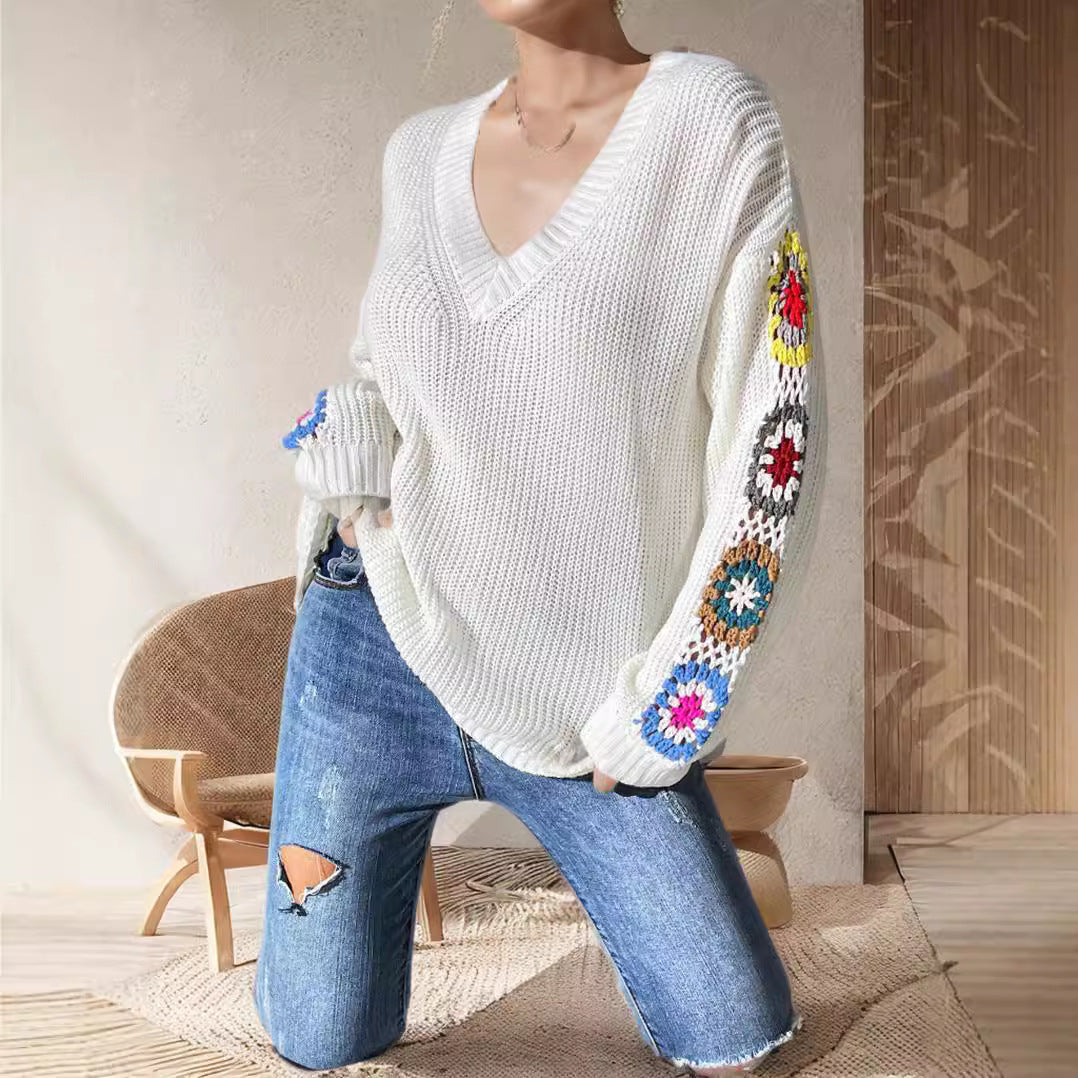 Dame mode strikket sweater med unik skæring og kreative hæklede motiver Stilla