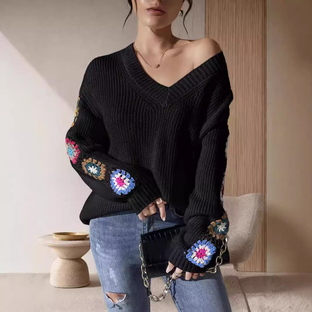 Dame mode strikket sweater med unik skæring og kreative hæklede motiver Stilla