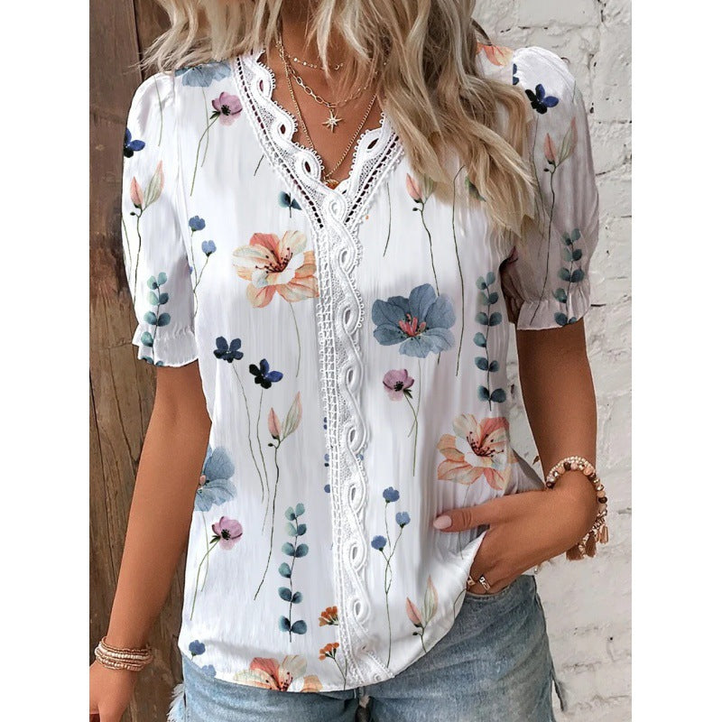 Damebluse med blomsterbroderi og knaplæst Stilla