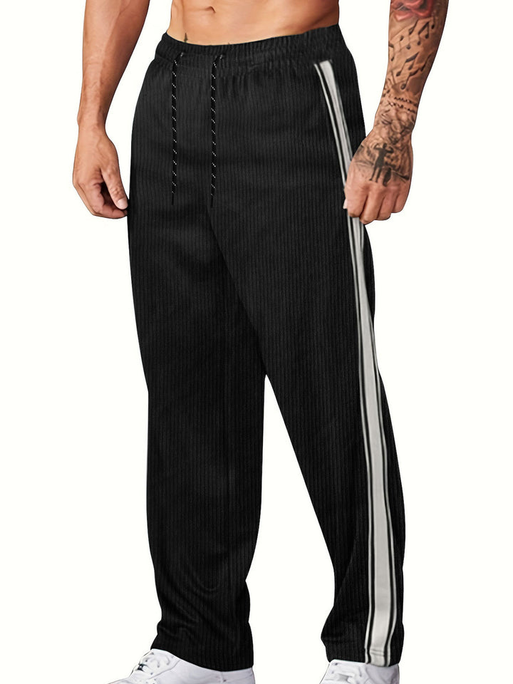 Herren nan ribbet Relax-Joggingbukser med bred ben, siden piping og elastisk snørebånd Skovae