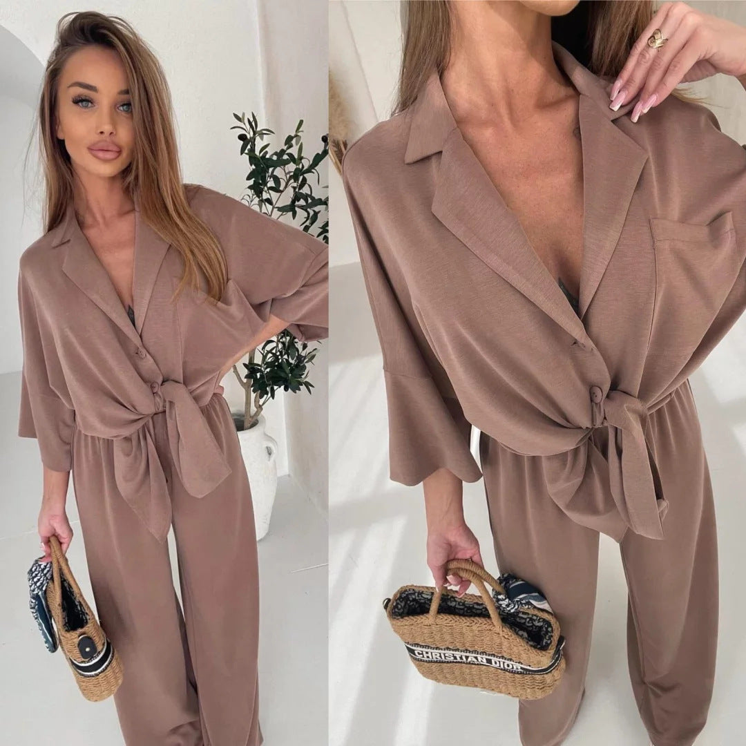 Kvinders afslappede jumpsuit med bælte og bredskårede ben