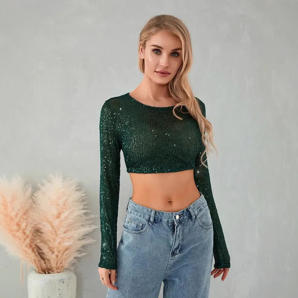 Kvindernes glitrende crop top med lange ærmer og tætsiddende pasform