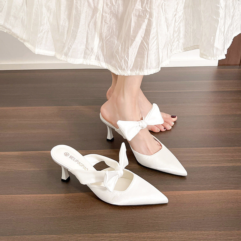 Dame Sling-pumps med elegant sløjfeapplikation og spids design Stilla