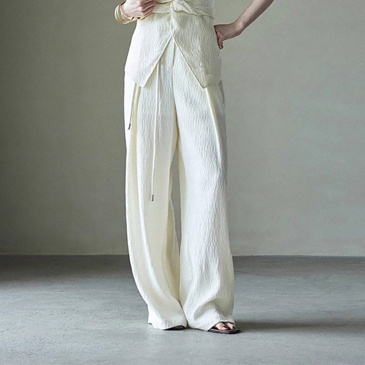 Dame indpakningsoverdel med asymmetrisk design og fint struktureret materiale Stilla