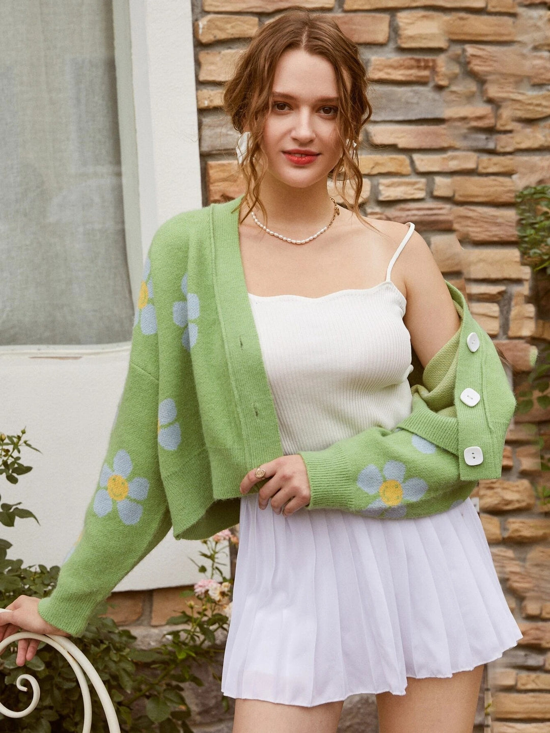 Kvinders chunky strik cardigan med blomstermønster og knapdetaljer Stilla